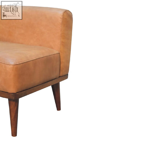 Tan buffalo backrest footstool with tan leather armchair and solid mango wood legs in chestnut finish
