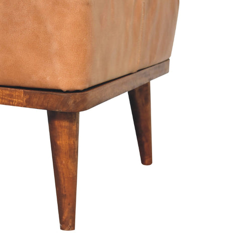 Tan leather armchair with wooden frame and tapered legs made from durable buffalo leather for stylish comfort