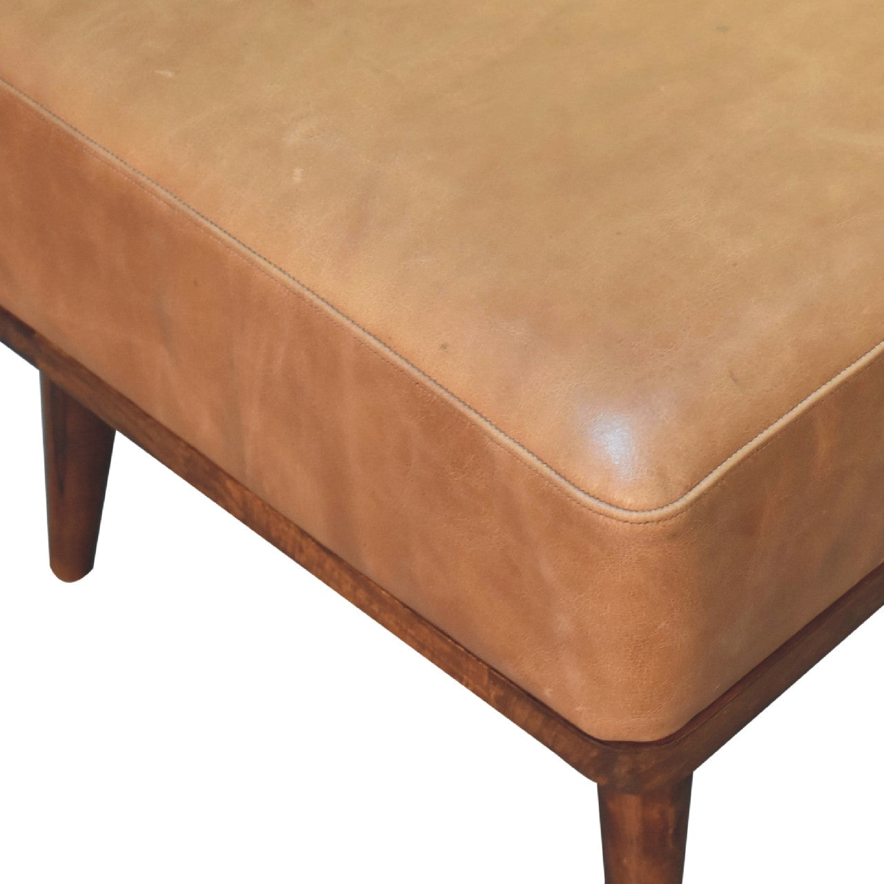 Tan buffalo leather footstool with tan leather upholstery and wooden legs perfect for relaxing feet