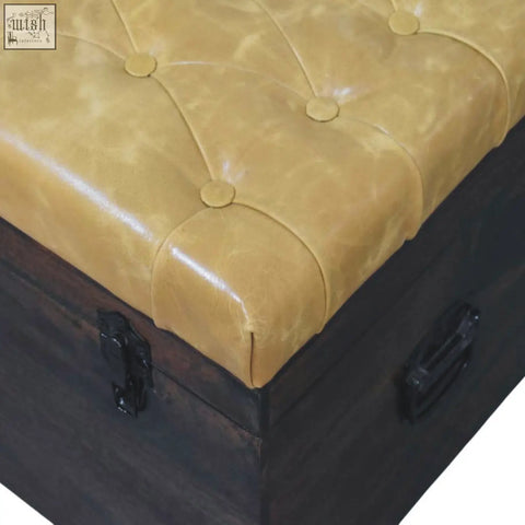 Tan leather storage trunk bench with tufted seat dark wood frame and black metal hardware for stylish storage trunk