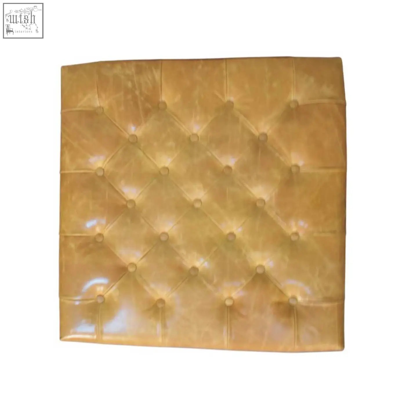 Tan leather upholstered ottoman with a golden tufted leather headboard featuring diamond-patterned stitching and glossy finish