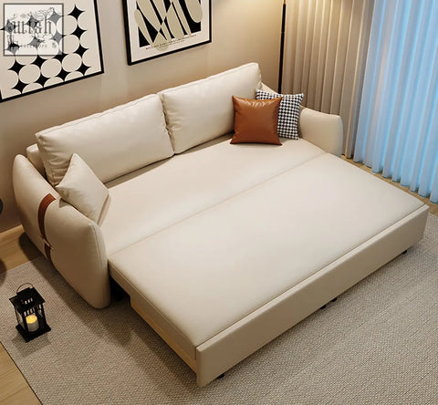 Cream-colored leathaire tanak two seater sofa bed with plush cushions and a sleek modern design