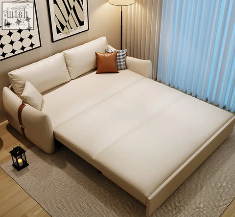 Cream-colored leathaire tanak two seater sofa bed with plush cushions and sleek modern design in multiple colours