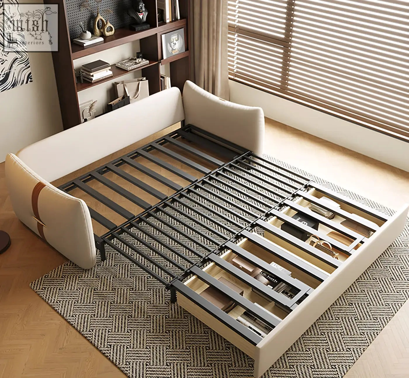 Cream upholstered two seater sofa bed with sleek metal slat base and built in storage drawers in leathaire