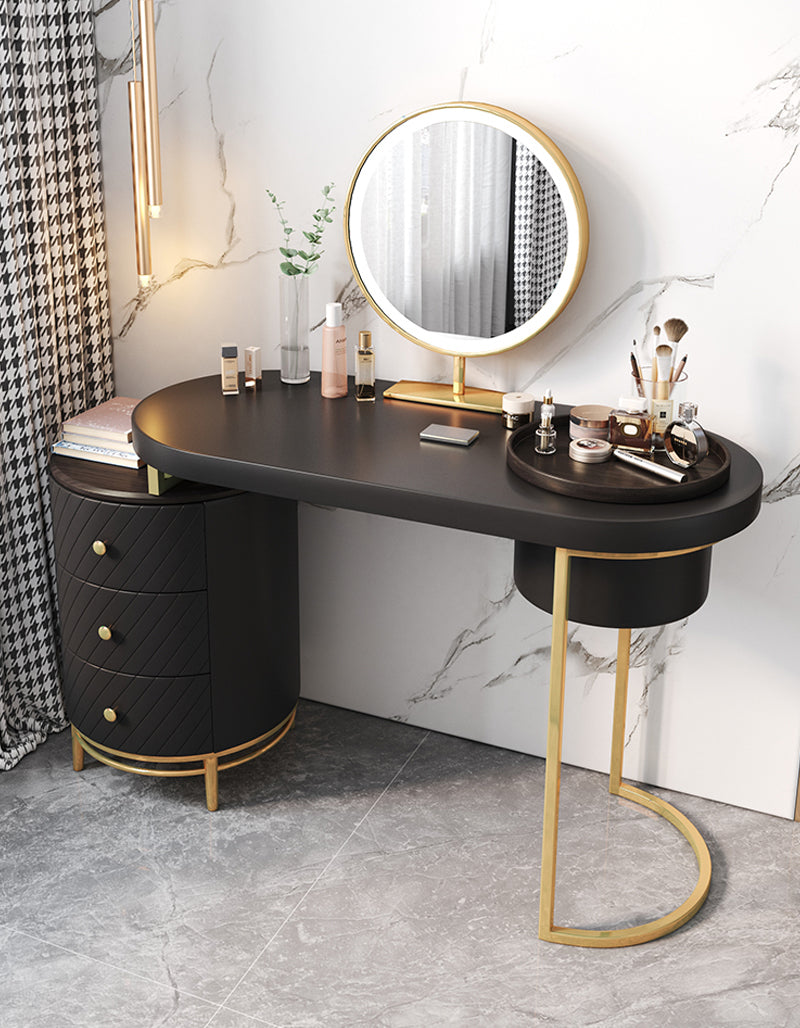 Black and gold tandy dressing table with curved top three drawers and integrated circular led mirror above it