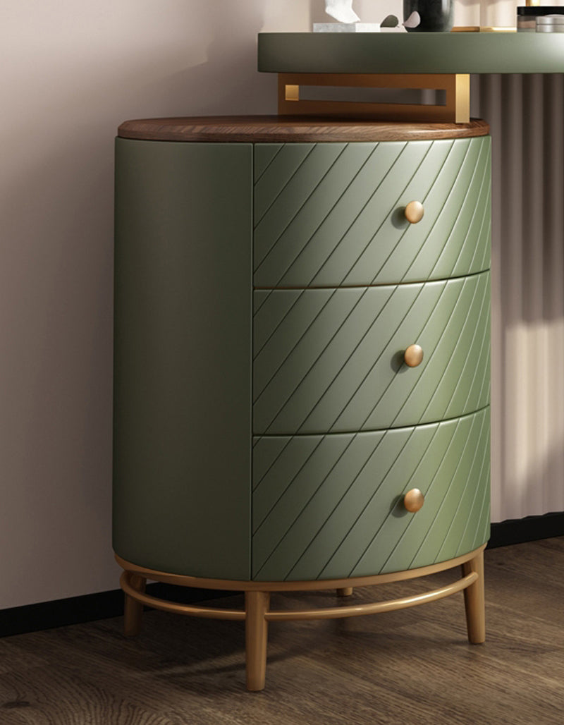 Olive green cylindrical dresser with diagonal quilted leather drawers and wooden knobs for tandy dressing table