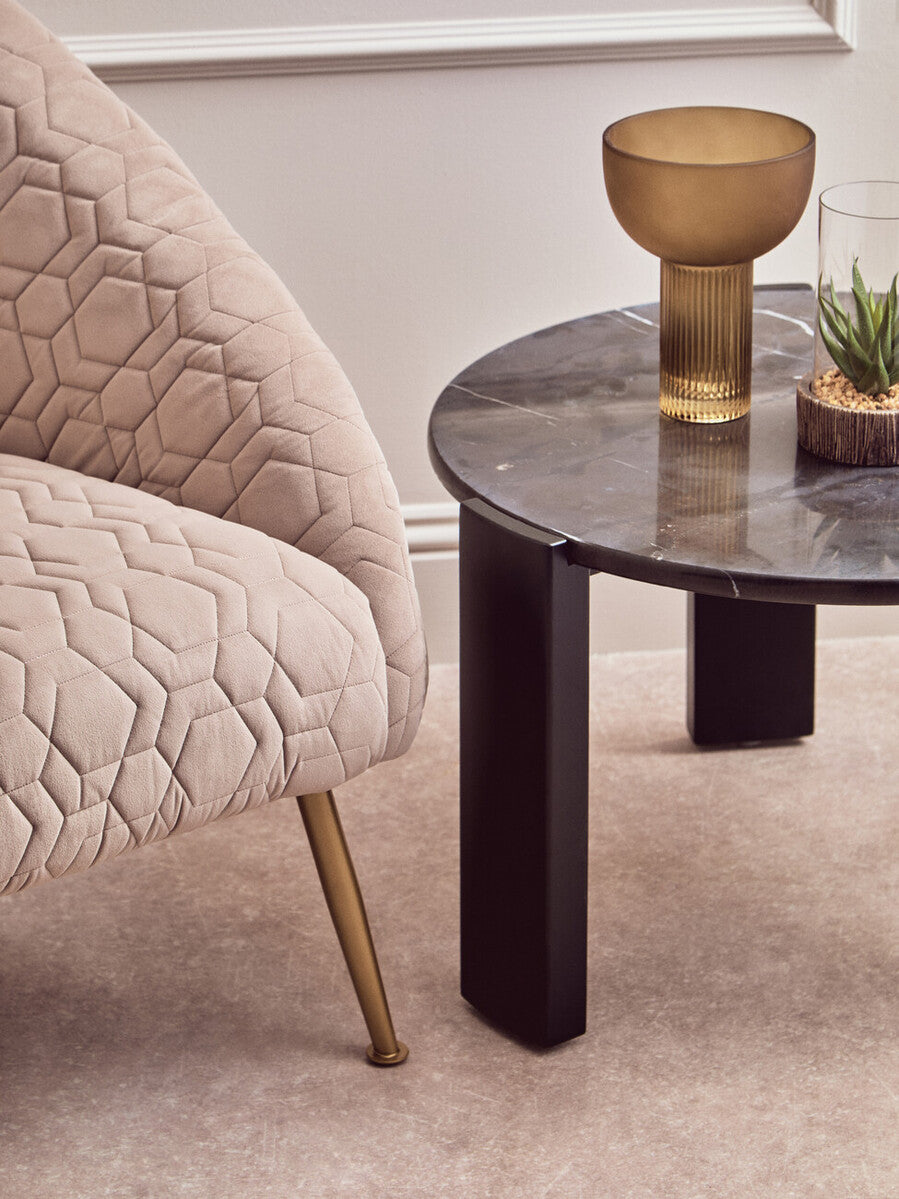 Beige quilted velvet natural occasional chair with gold tone legs perfect for stylish living spaces
