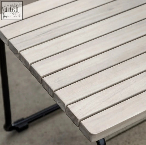 Light gray wooden slat dining table with black metal legs paired with taranto dining chair x 2