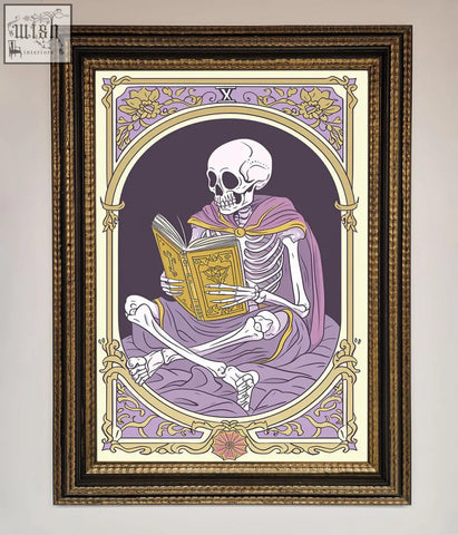 A framed print of a tarot skeleton reader in a purple robe holding a golden book with floral and roman numeral x design