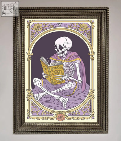 A framed print of a tarot skeleton reader in a purple robe holding a golden book with floral and roman numeral x design