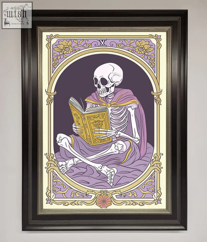 A framed print of a tarot skeleton reader in a purple robe holding a golden book within a decorative arch border
