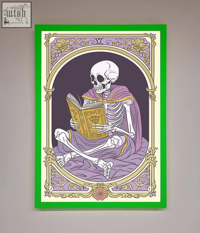 Framed print of a tarot skeleton reader in a purple robe holding a golden book with a green and gold border