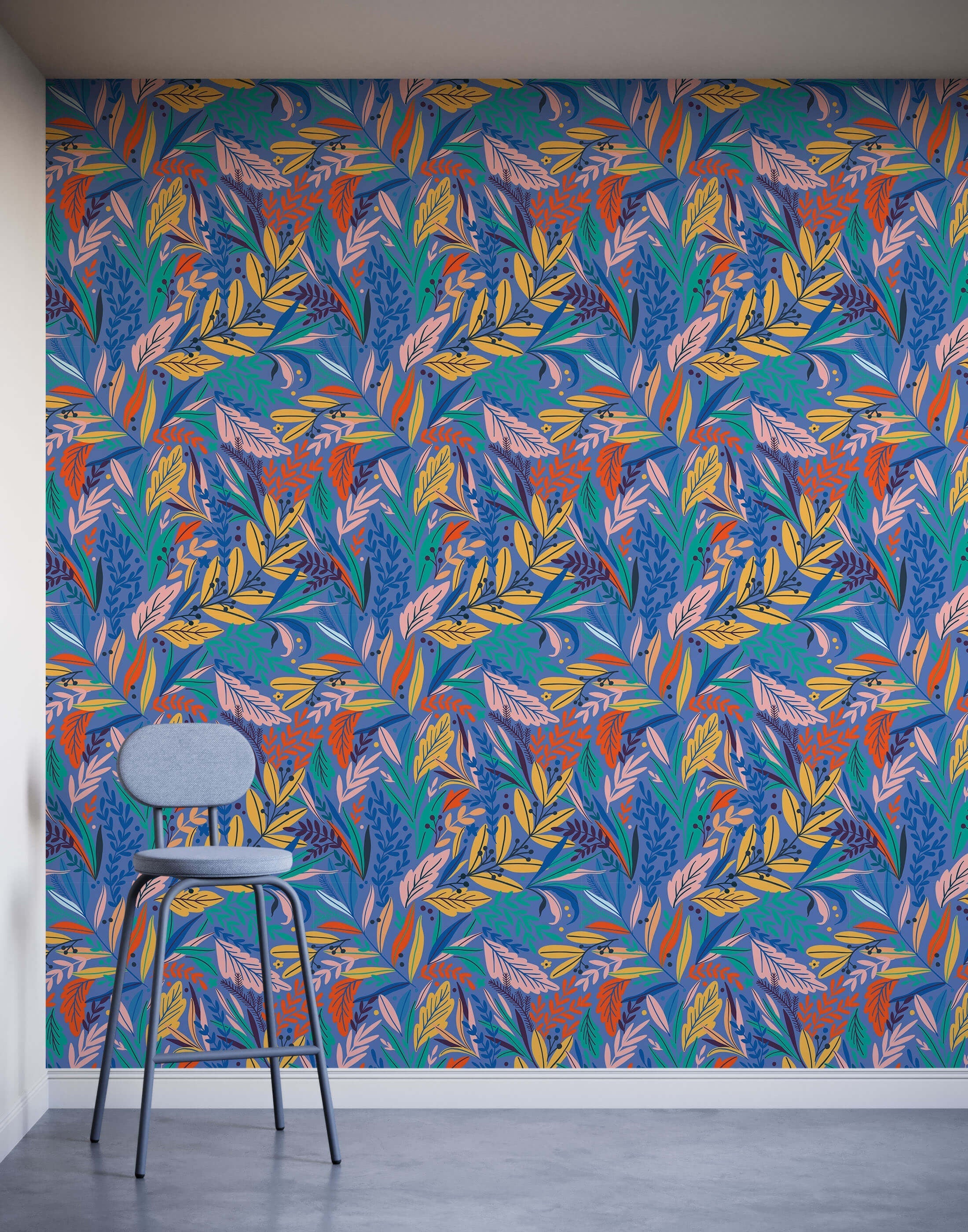 A modern gray metal stool tate with minimalist design and cushioned seat against floral wallpaper background