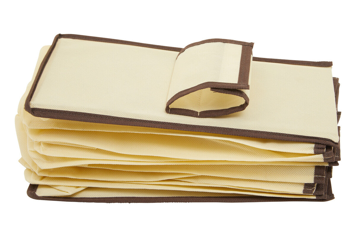 Stack of beige fabric hanging shoe organiser with brown trim and foldable design for easy shoe storage