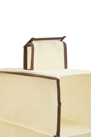 Cream cream brown trim hanging shoe organiser with 10 sections and a small house shaped compartment on top