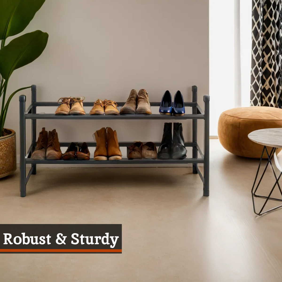Dark gray metal two tier shoe rack with minimalist design perfect for organizing shoes in small spaces