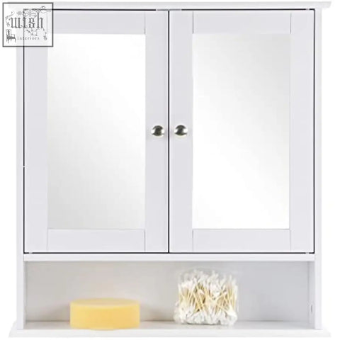 White double mirrored bathroom cabinet with silver knobs and lower shelf holding toiletries by taylor and brown maine white