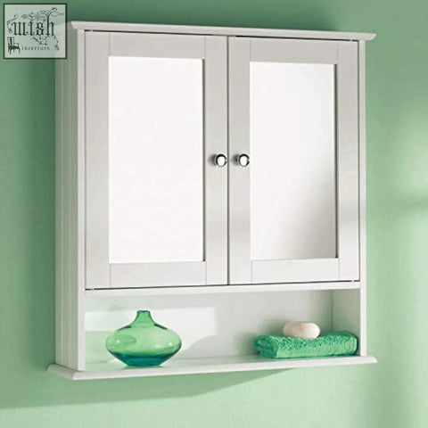 White double mirrored wooden medicine cabinet with silver knobs and lower storage shelf brown maine white style
