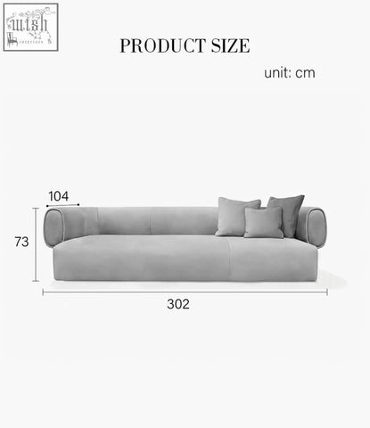 Gray velvet two seater sofa with rounded armrests and three matching throw pillows offers financing and low shipping cost