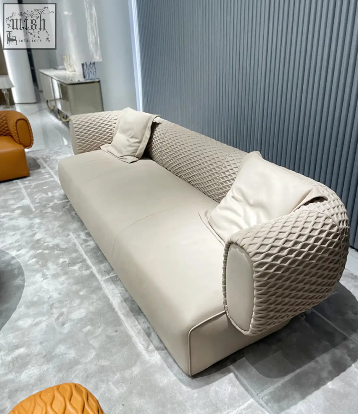 Beige leather taylor three seater sofa with quilted textured armrests and cushions offer financing available shipping cost info