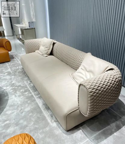 Beige leather taylor three seater sofa with quilted textured armrests and cushions offer financing available shipping cost info