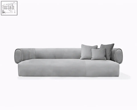 Modern gray velvet three seater sofa taylor with rounded armrests and matching throw pillows offer financing available