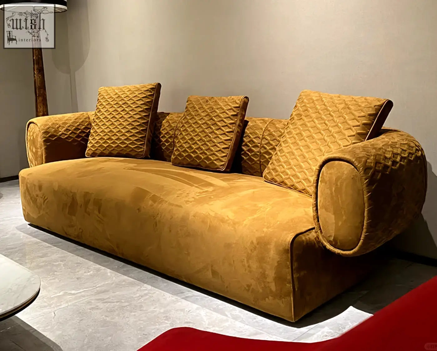 A plush mustard-yellow velvet three seater sofa with quilted cushions and rounded armrests offering financing options