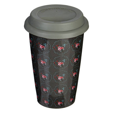 Black ceramic travel mug with silicone lid featuring pink roses in ornate frames in taza ditsy floral design