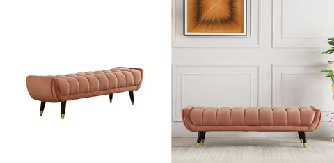 A sleek tb15 orange bench in tufted rose gold velvet with black legs and golden caps for stylish seating
