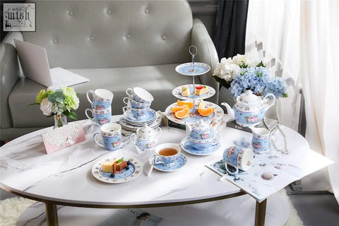 Blue and white porcelain tea set with milk jug sugar bowl and floral patterns perfect for gift box occasions