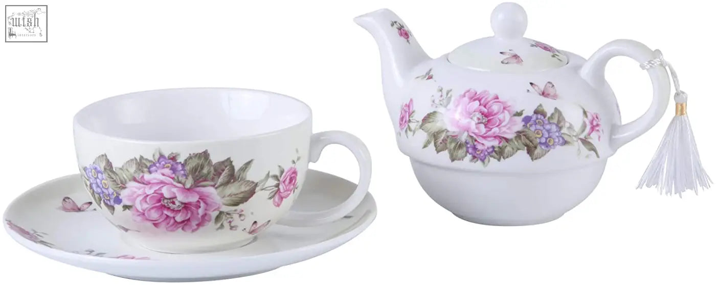 White porcelain tea for one teapot with pink floral design and tassel in a beautiful gift box from a london boutique