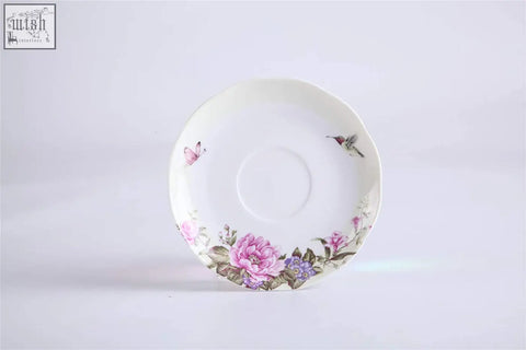 White ceramic saucer with pink purple floral patterns butterfly hummingbird comes in beautiful gift box from london boutique