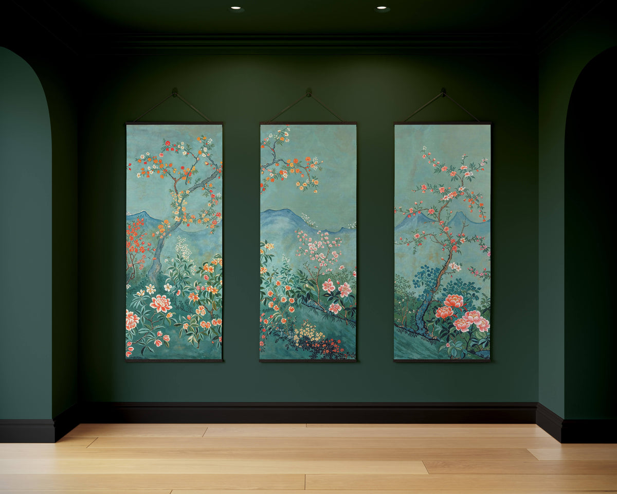 Three-panel teal chinoiserie tapestry with traditional floral and mountain landscape on a muted teal chinoiserie wall