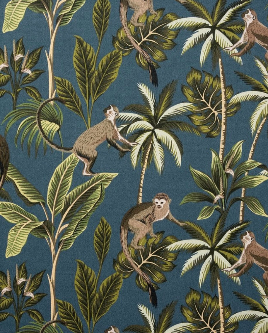 Deep teal french drum lampshade with jungle monkey cotton fabric featuring brown monkeys and tropical foliage