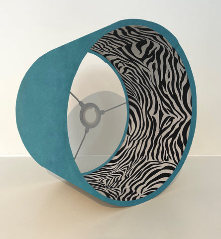Teal velvet double sided drum lampshade with bold black and white zebra cotton interior for ceiling light shade