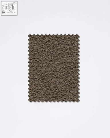 A rectangular brown teddyC-03 boucle fabric sample rug with plush looped pile and scalloped edges