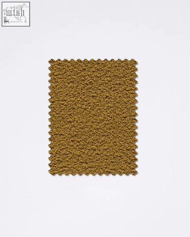A rectangular mustard yellow teddyc-10 boucle fabric sample with dense plush textured surface