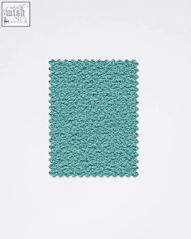 Teal plush teddyc-25 boucle fabric sample bath mat with soft fuzzy surface and scalloped edges