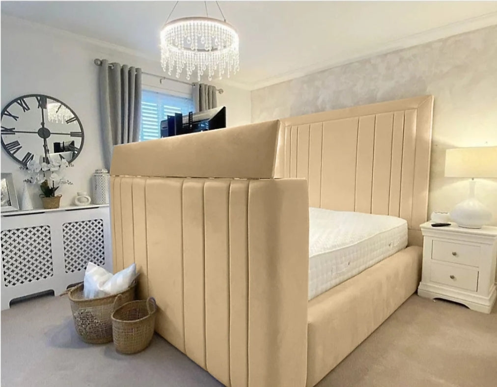 Beige upholstered telly bed with vertical tufted panels and matching headboard fits small double beds and tvs