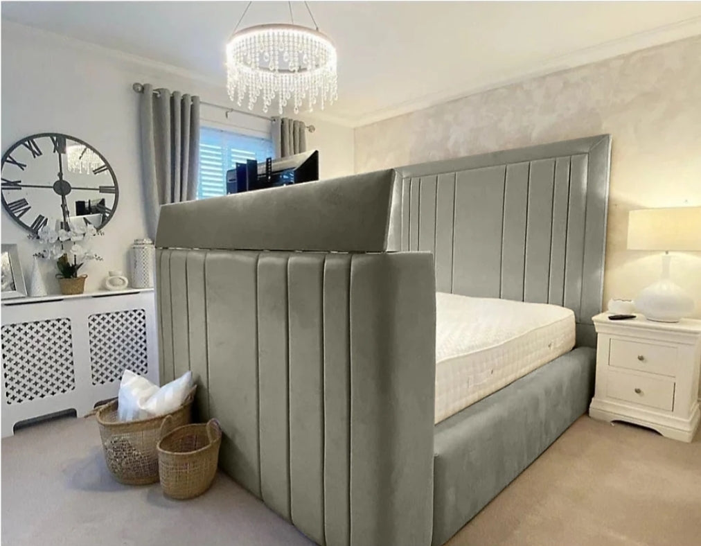 A sleek grey upholstered telly bed with tufted headboard and built-in storage base fits tvs small double size
