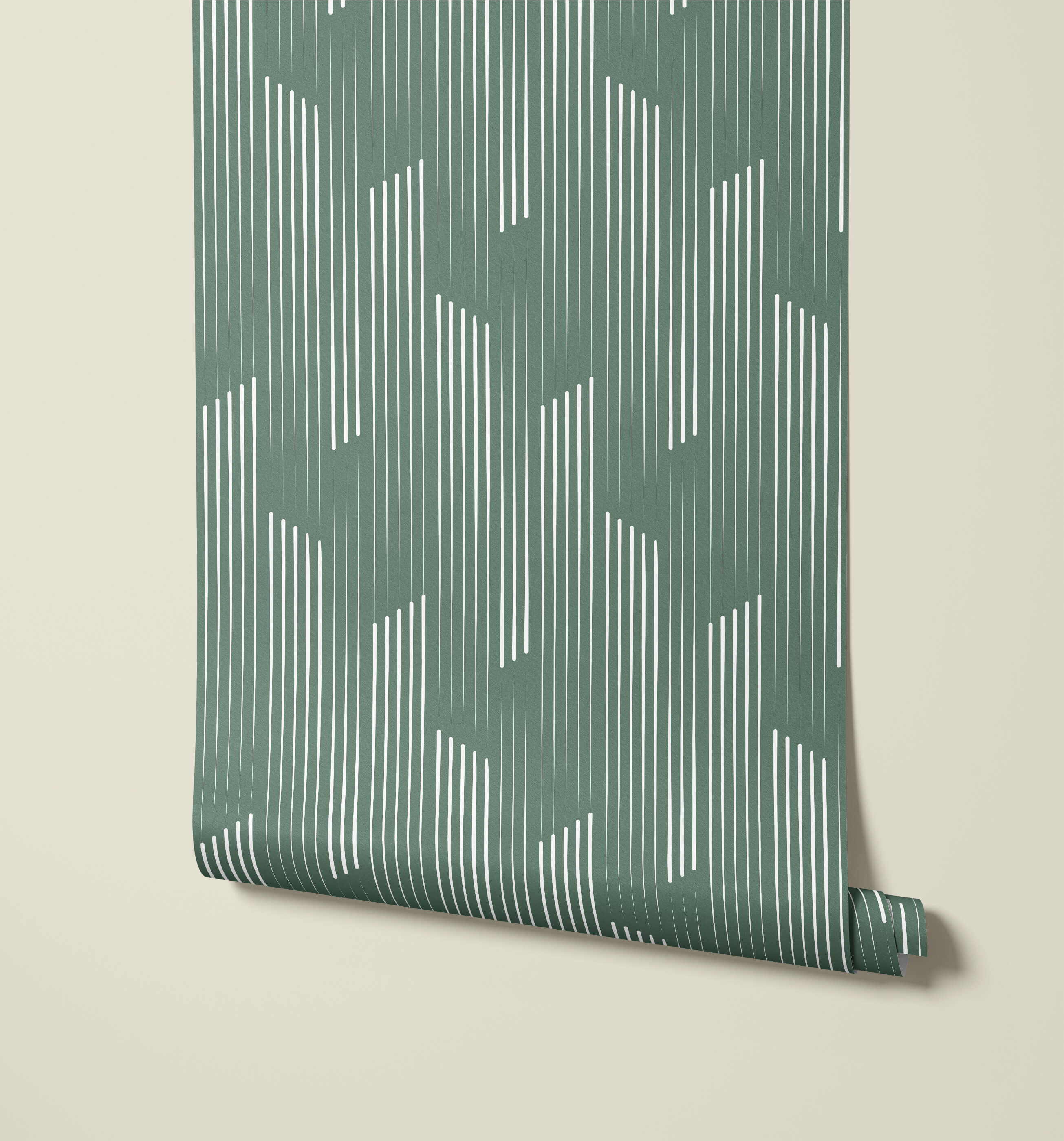 A roll of tempest wallpaper in muted sage green with white vertical geometric lines for modern wall decor