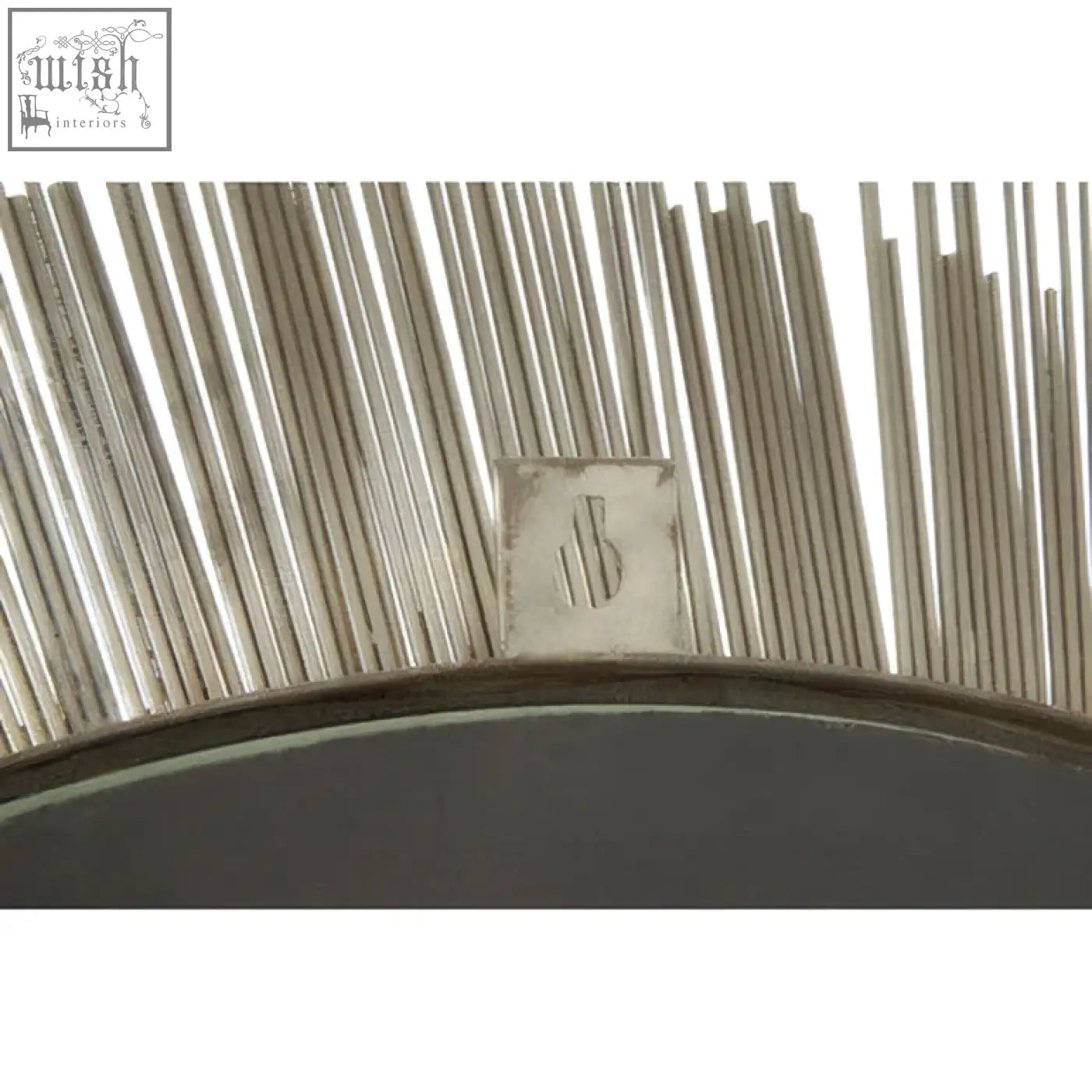 Templar brass finish wall mirror with silver sunburst design, slender metallic rays, and subtle engraved logo at center