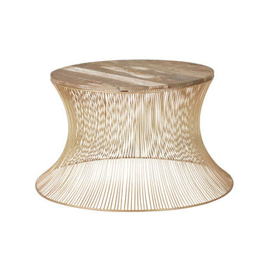A templar coffee table with a round light wood top and elegant curved gold metal wire base perfect for modern spaces