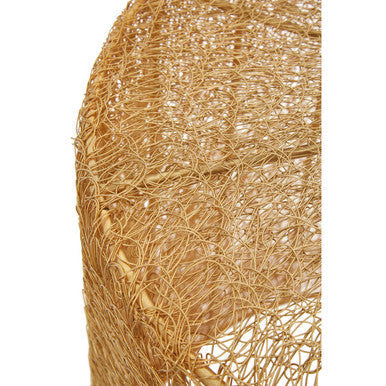 A woven natural-toned rattan lampshade with intricate texture pairs well with templar gold finish mesh set tables