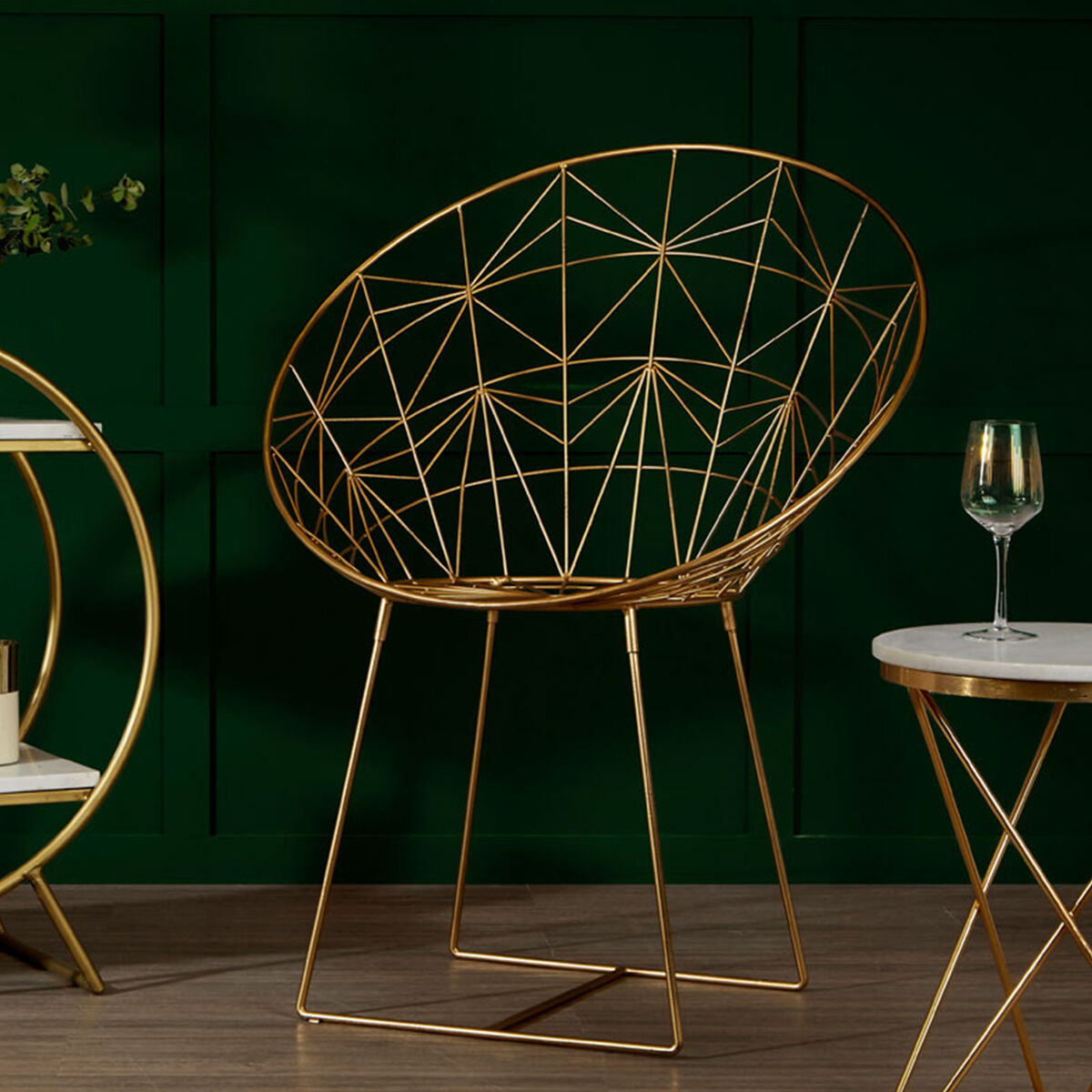 Golden wireframe geometric occasional chair with modern minimalist design in templar gold frame style