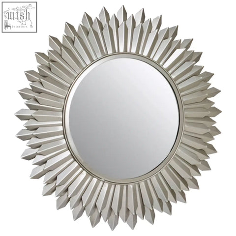 Templar sunburst wall mirror with silver metallic frame and pointed rays adds style to any sunburst wall decor