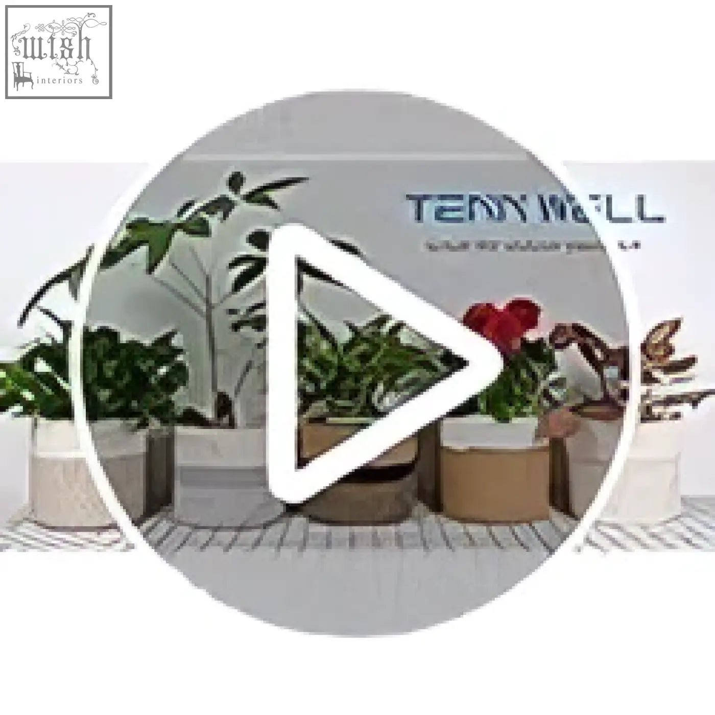 A sleek silver metal play button with red accent alongside a white and grey tenn well 20cm plant pot for indoor plants