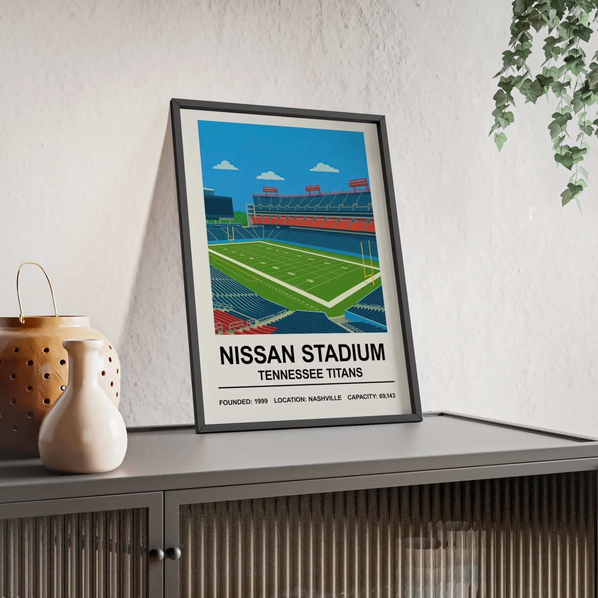 A framed print of nissan stadium with vibrant green turf blue seats and red end zones for tennessee titans fans