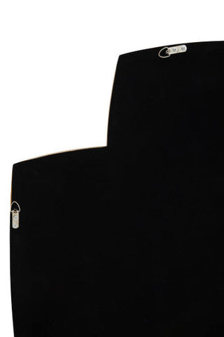 Black velvet clutch with silver-toned hardware next to terni gold finish wall mirror with gold-effect frame