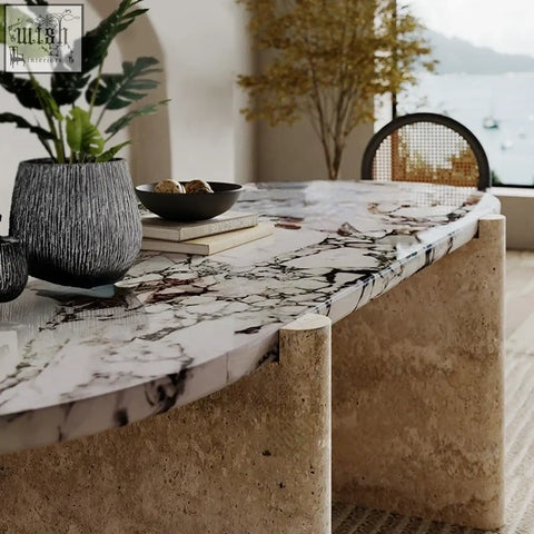 Teruo dining table with sleek curved marble top and sturdy beige stone base perfect for stylish dining spaces